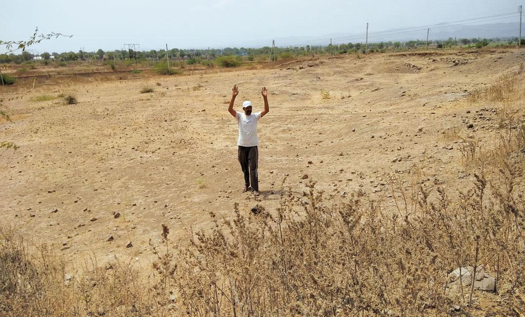 Sukhdev Patidar
of Nasirpur has
been allotted a
low-lying plot on a
rocky terrain, which
gets waterlogged
every monsoon. He
says he would need
to fill the plot with
2.5 m of earth to
make it habitable. Sukhdev Patidar
of Nasirpur has
been allotted a
low-lying plot on a
rocky terrain, which
gets waterlogged
every monsoon. He
says he would need
to fill the plot with
2.5 m of earth to
make it habitable.