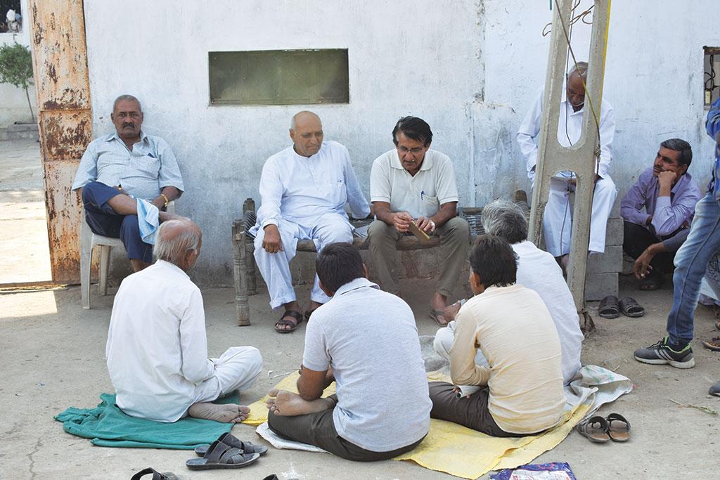 Farmer leader Sagar Rabari (top row, second from right) is mobilising farmers of Morbi district to demand Narmada water usage data from the government Farmer leader Sagar Rabari (top row, second from right) is mobilising farmers of Morbi district to demand Narmada water usage data from the government