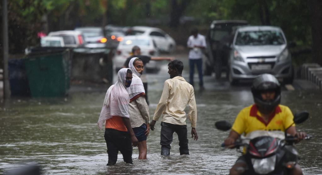 The heavy showers led to several roads being inundated, the Delhi Traffic Police said. A portion of the road caved in the city’s Dwarka region and car got stuck in it. No injuries were reported. Photo: Vikas Choudhary