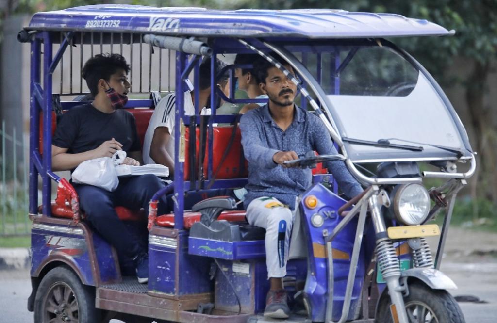 Among the public services that opened were the city’s buses, the Delhi Metro, cinema halls and spas. Despite having suffered immensely in the second wave, people have either not learnt their lessons well or they have become careless. Here, commuters in an electric rickshaw in Mayur Vihar can be seen wearing masks wrongly or not wearing them at all. Photo: Vikas Choudhary / CSE