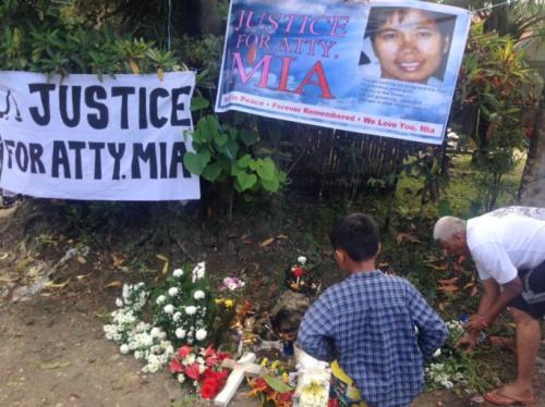 Mourners lay flowers for Mascariñas-Green on Feb. 18. According to her family, “thousands of people from all walks of life – the fishers, farmers, tricycle drivers, community workers, public servants, civil society members, religious groups, the young and old, men and women,” paid their respects. Photo courtesy of LezGrIB New Gen Unlimited