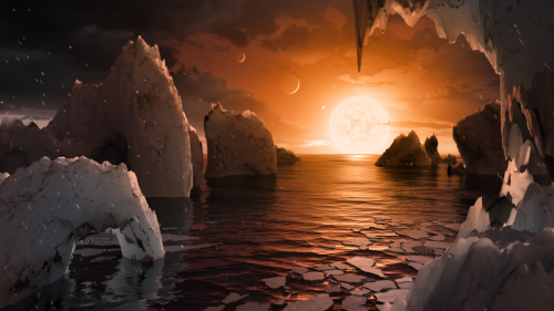 This illustration shows the possible surface of TRAPPIST-1f, one of the newly discovered planets in the TRAPPIST-1 system. Scientists using the Spitzer Space Telescope and ground-based telescopes have discovered that there are seven Earth-size planets in the system
Credits: NASA/JPL-Caltech