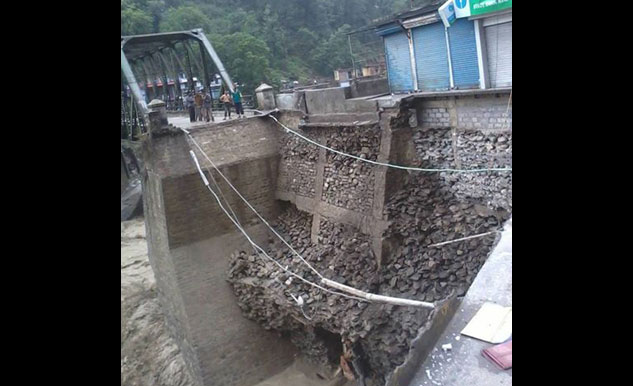 Heavy rains have washed away the road beyond the Pinderghati bridge